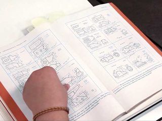 TechniqueU trainee reading a print